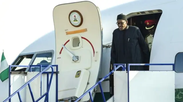 President Muhammadu Buhari coming out of a plane