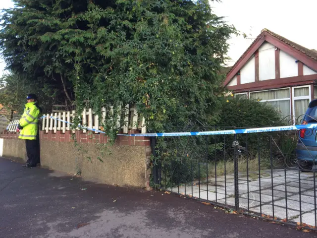 Bungalow surrounded with police tape