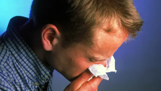 Man sneezing