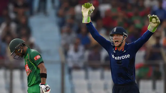 Jos Buttler celebrates the wicket of Sabbir