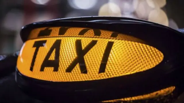 Taxi driver illuminated sign