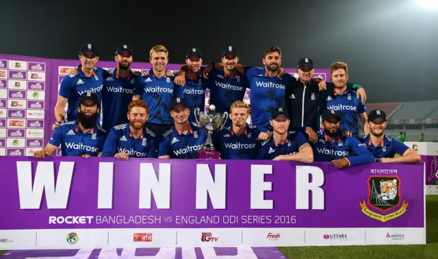 England's players celebrate at the end of the series