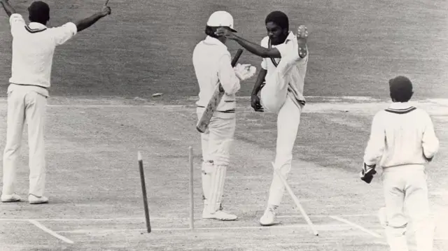 Michael Holding kicks out