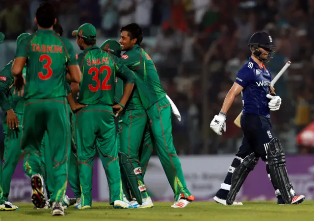 Ben Duckett walks off after being caught