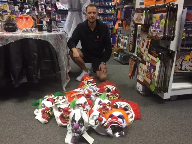 Peter Walker with clown masks