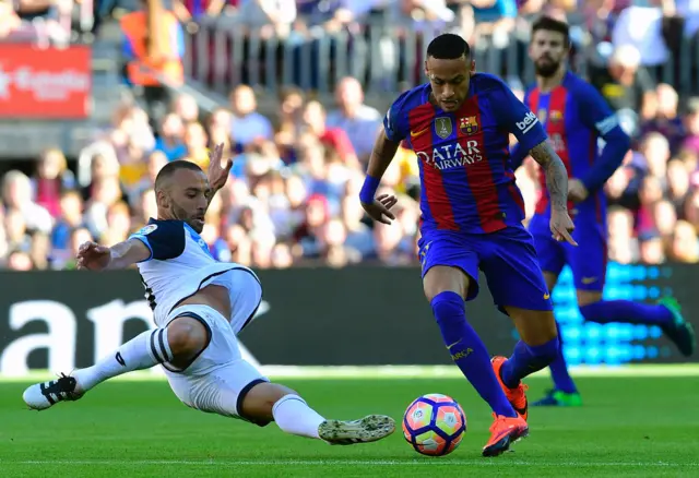 Neymar in action with Dos Santos