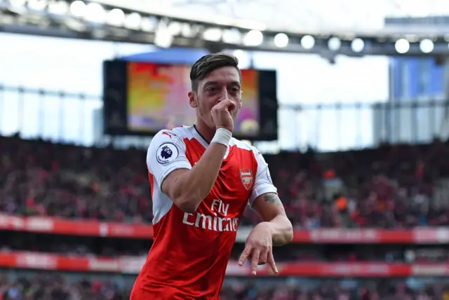 Mesut Ozil of Arsenal celebrates