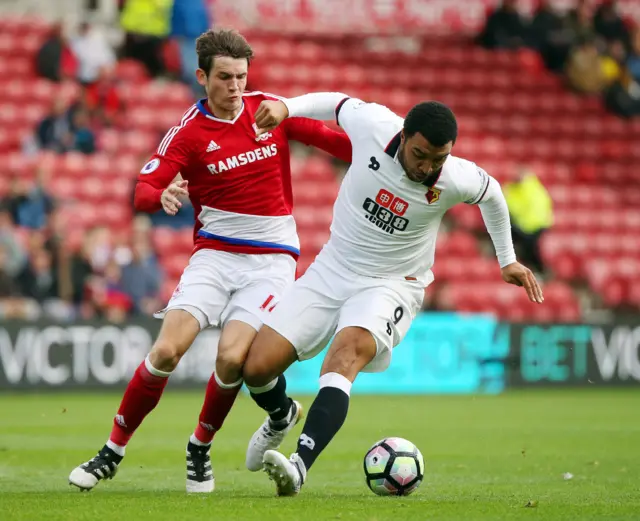 Marten De Roon and Troy Deeney