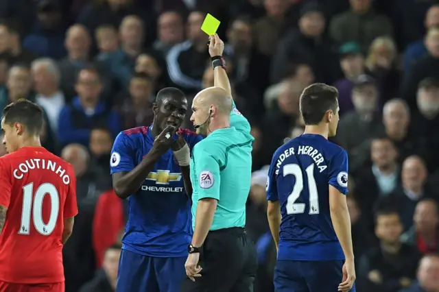 Eric Bailly is booked