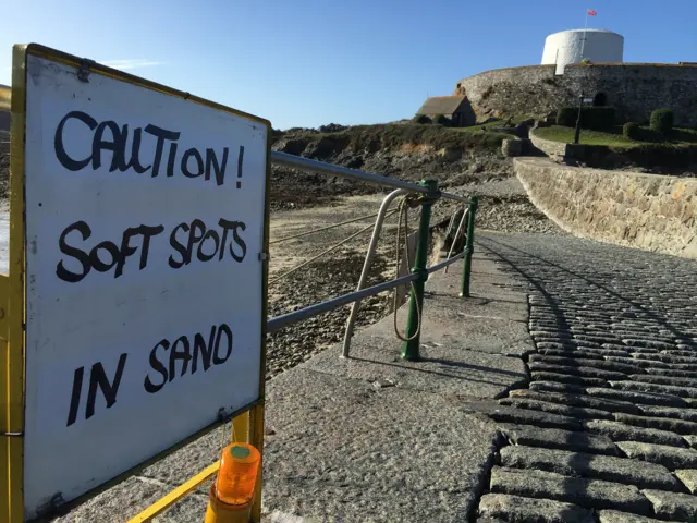 The warning signs of Rocquaine Beach