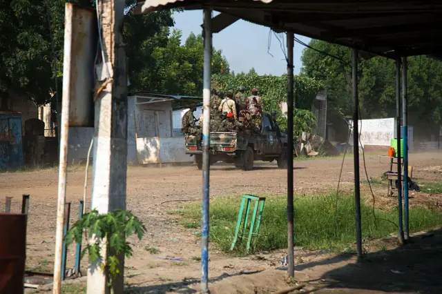 Soldiers of the Sudan People Liberation Army (SPLA) patrol Malakal, northern South Sudan
