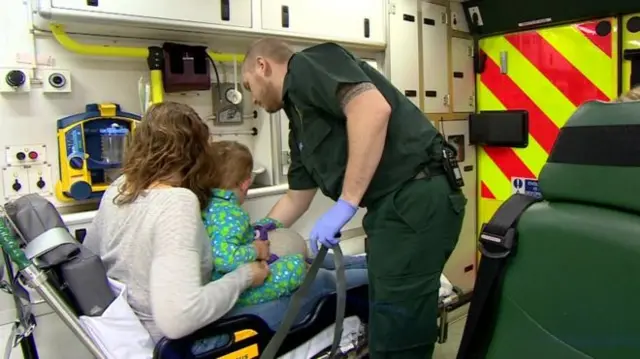 Mother and child in ambulance