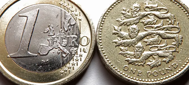 a pound coin and euro coin