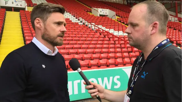 Graham Alexander talking to BBC Radio Humberside's Mike White