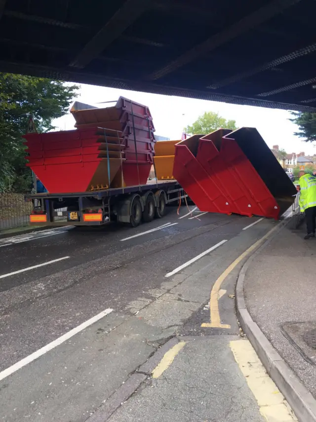 Skips under a bridge