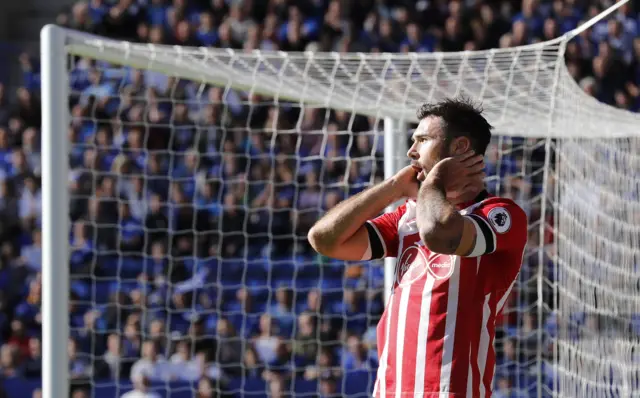 Charlie Austin reacts to a missed chance