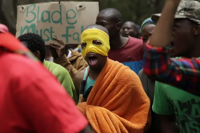 Students demonstrate downtown Pretoria, South Africa, Thursday, Oct. 20, 2016.