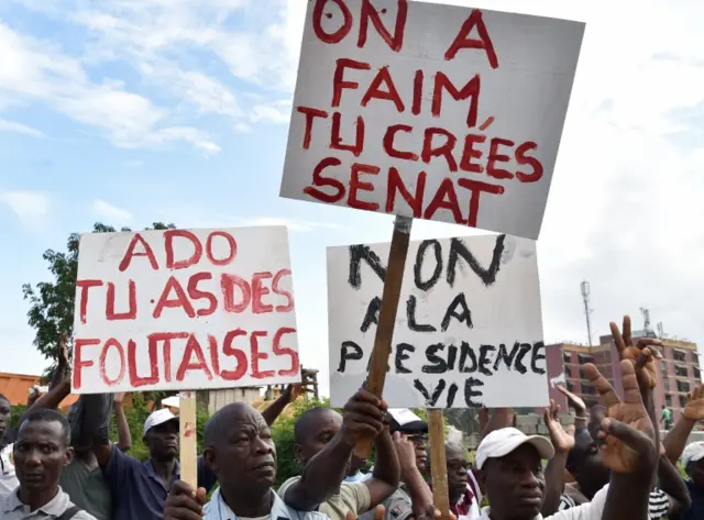 Opposition supporters holding placards reading "No to a presidency for life", Abidjan, Ivory Coast - 20 October 2016