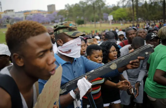 Students from various universities march to the Union Buildings during ongoing protests against the cost of higher education in Pretoria, South Africa, 20 October 2016.