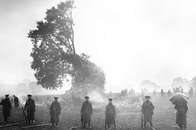 Sentries guarding the wreckage of the German Navy Zeppelin L31