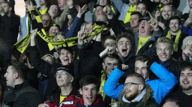 Burton supporters celebrate