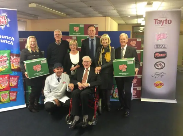 Biff Riley (94) is being shown around the crisp factory he founded with his brother - now the Golden Wonder factory in Scunthorpe