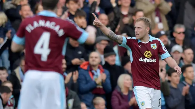 Scott Arfield celebrates