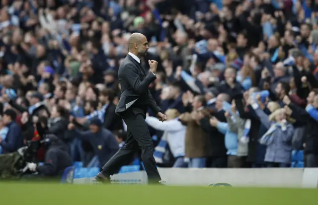 Pep Guardiola celebrates