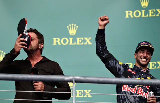 Ricciardo forces actor Gerard Butler to drink out of his shoe