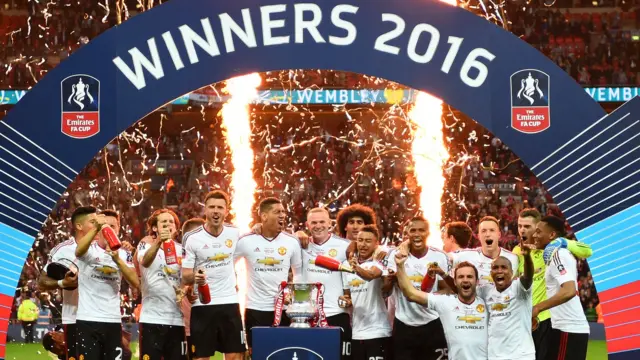 Manchester United celebrating FA Cup win in May