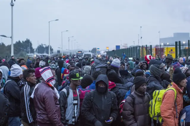 Queues of migrants in Calais