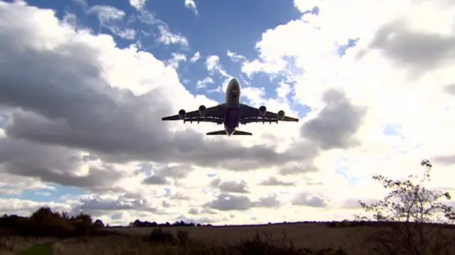 A plane taking off from Birmingham Airport