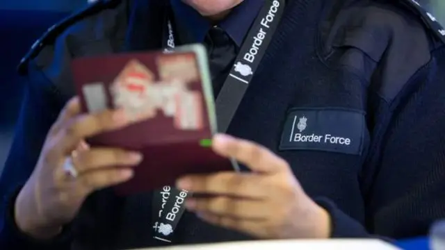 Border Force checking a passport