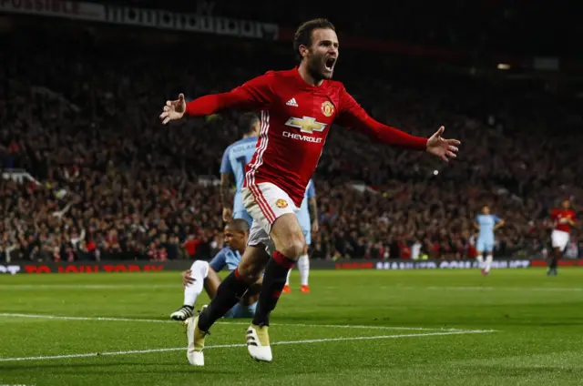 Juan Mata celebrates