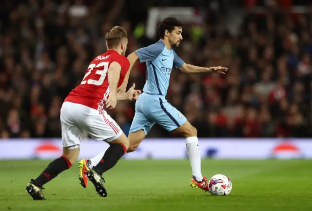 Jesus Navas and Luke Shaw