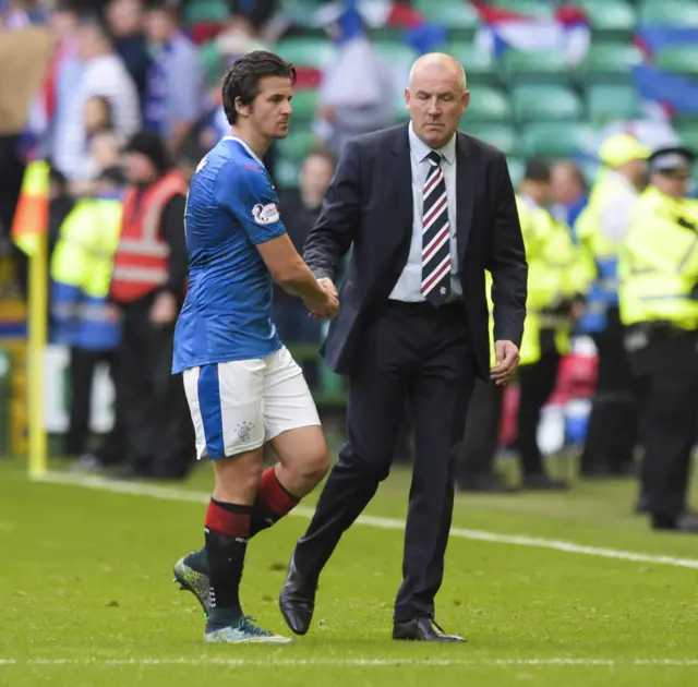 Rangers midfielder Joey Barton (left) and manager Mark Warburton