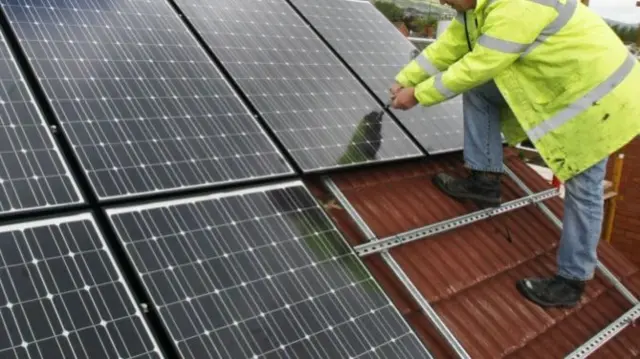 Solar panels being installed