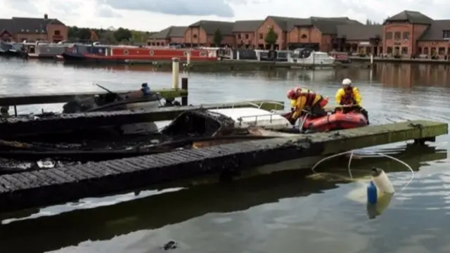 The scene after the fire at Barton Marina