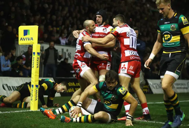 Gloucester celebrate try