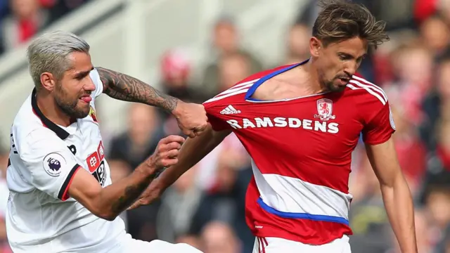 Watford player fouls a Middlesbrough player