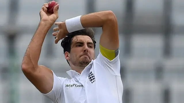 Steven Finn bowls