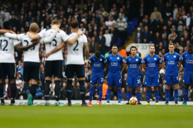 Players line up for a minute's silence