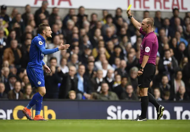 Jamie Vardy is shown a yellow