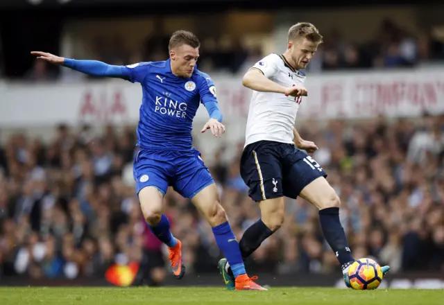 Eric Dier in action with Leicester's Jamie Vardy