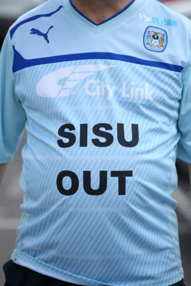 Coventry City shirt with "Sisu Out"