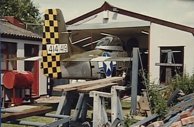 The Mustang undergoing restoration work