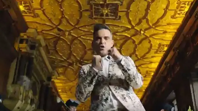 Robbie Williams in the Long Gallery at Hatfield House