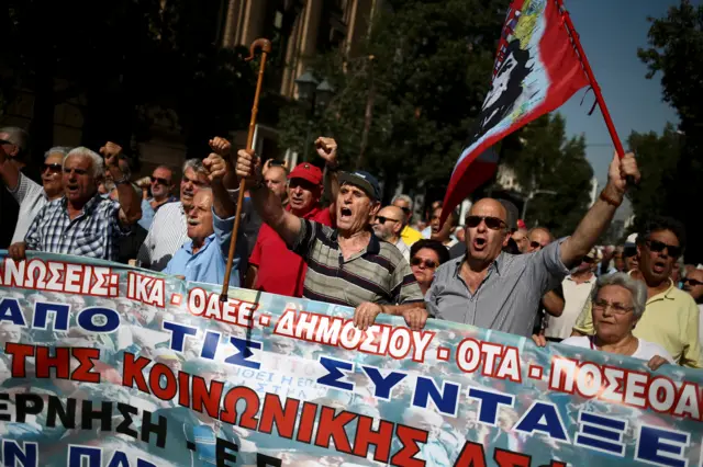 Greek pensioners shout slogans during a demonstration against planned pension cuts, in Athens, Greece, October 3, 2016