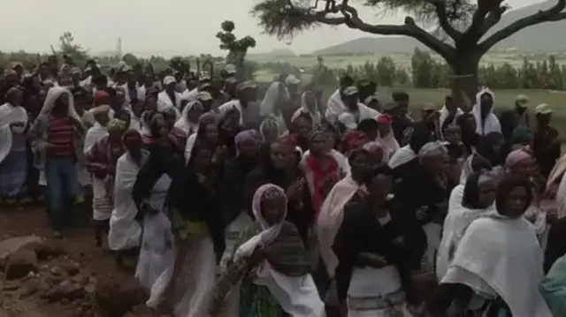 Mourners at funeral