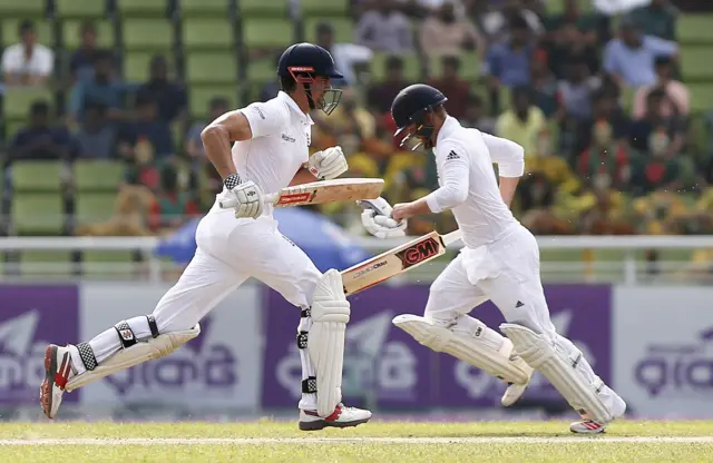 Alastair Cook and Ben Duckett run between the wickets